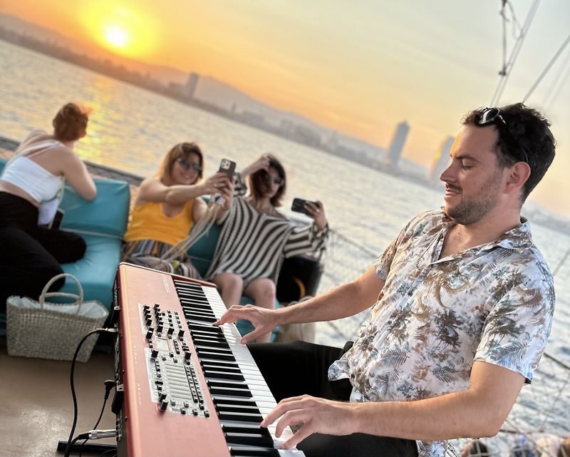 Sunset Catamaran Cruise in Barcelona with Live Music - Music, drinks, and the onboard mood