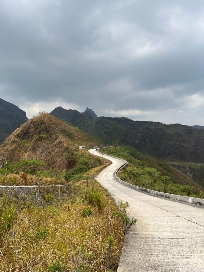 Surabaya Mount Kelud Full-Day Private Trekking Tour - Walking uphill toward Kelud’s crater rim