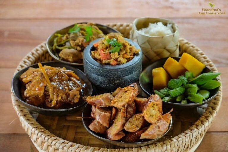 Thai Cooking Classes by Grandmas Home Cooking School - A garden with herbs, vegetables and chickens