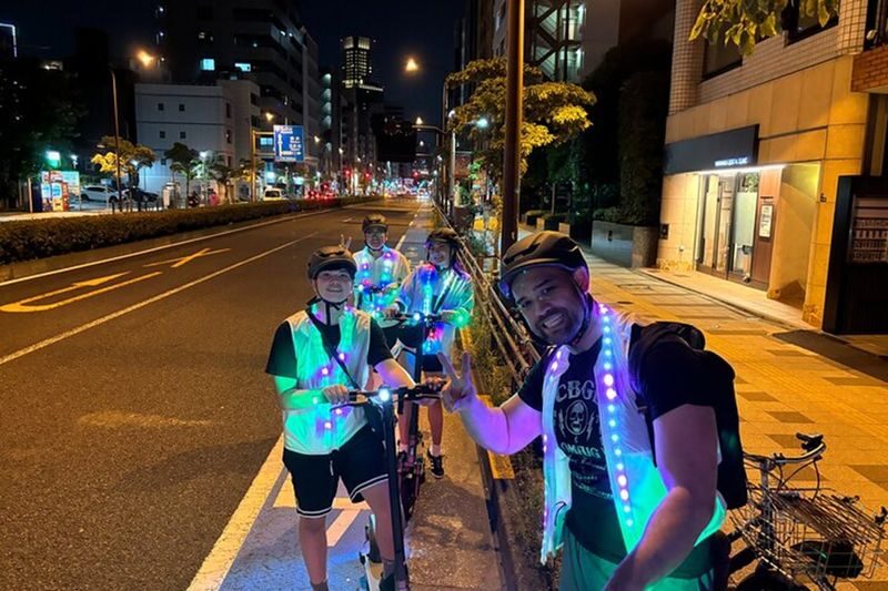 Tokyo Night E-Scooter Tour with Tokyo Tower - Following the streets around Minato
