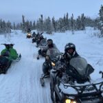 Yellowknife outdoor experience snowmobile - Crossing Great Slave Lake
