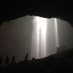 Yogyakarta Jomblang Cave Private Day Tour - Ropes, boots, and the muddy walk inside Jomblang