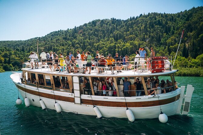 Split: Krka Waterfalls Tour, Boat Cruise & Swimming - Cruising Along the Stunning Krka River