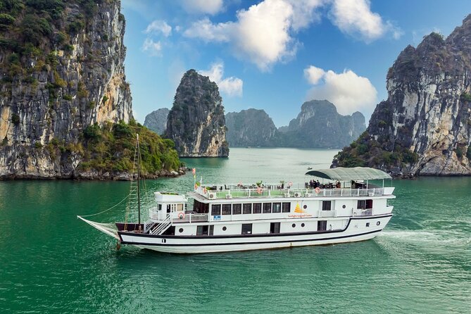 Halong Bay 2D1N Traditional Boat All Inclusive Suppring Cave,Titop,Luon Cave - Visiting the Scenic Titop Island