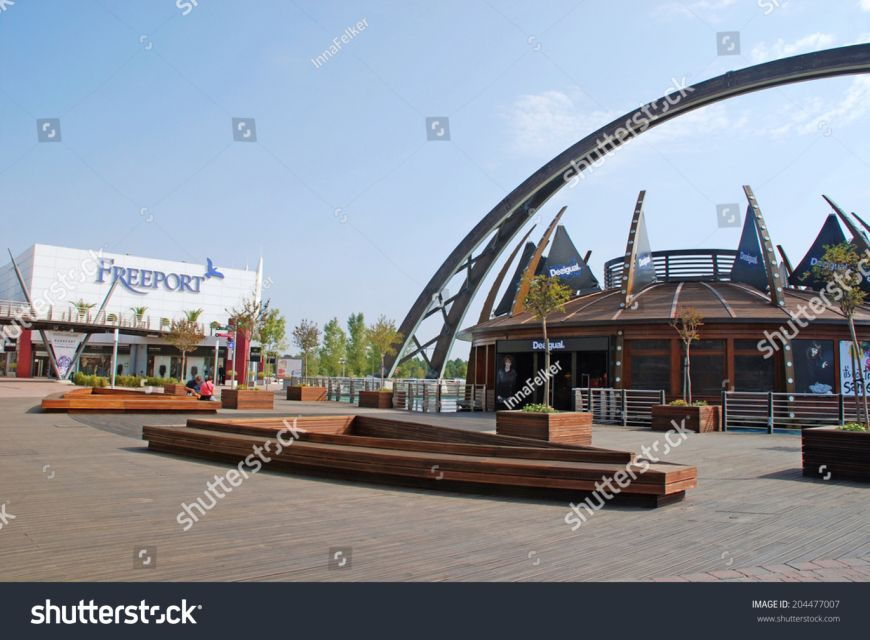 From Lisbon: Round-trip Shuttle to Freeport Fashion Outlet - Good To Know